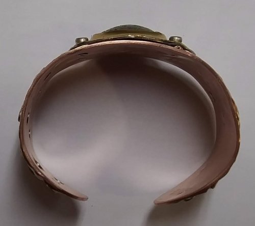 Judy Larson's Fold Formed Cuff With Faux Roman Glass or Coin Cabochon - , Metalwork, Cutting, Cutting Tool, Cutters, Dapping, Dapping Jewelry, Filing, Finishing, Forging, Forging Jewelry, Jewelry Forging, How To Punch Holes, Hole Punching, Punch A Hole, Oxidizing Wire, Oxidizing, Antiquing Wire, Antiquing, Riveting, Riveting Techniques, Wire Rivets, Sawing, Saw, Wire Saw, Texturing, Drilling, Drill, Fold Formed Faux Roman Glass Cuff